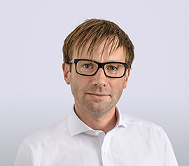 Dr. Christian Schrader